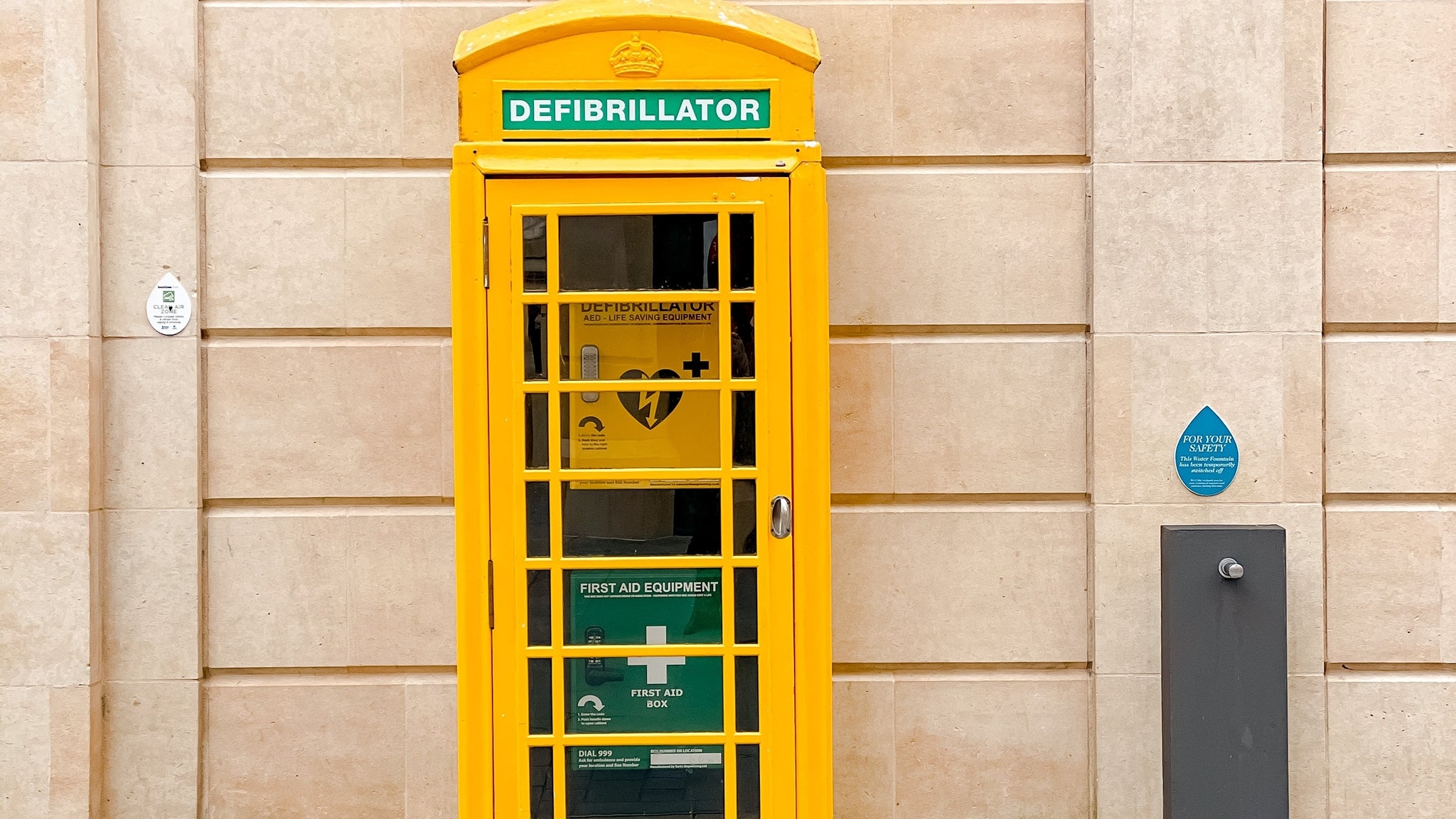 Defibrillator in yellow telephone booth